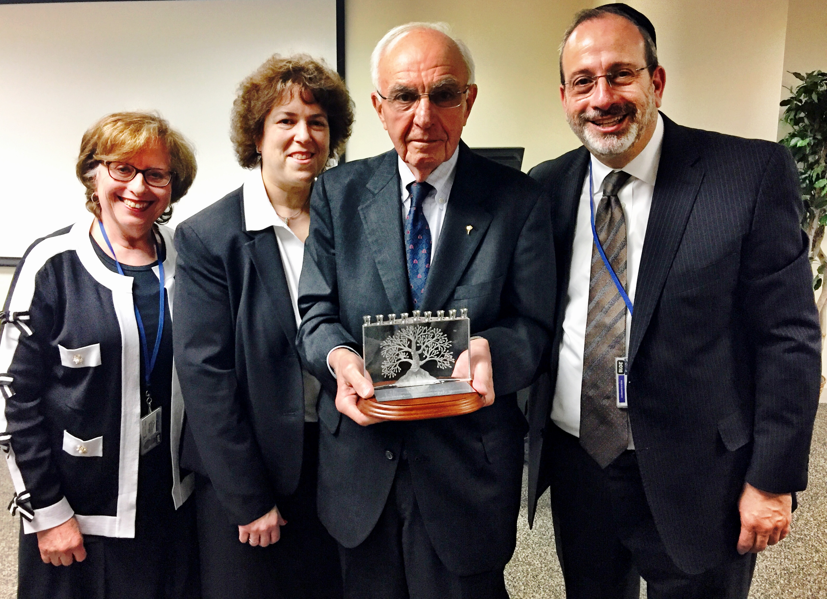 Dr. Arnold Spinner, presented with a gift on the occasion of his retirement. L-R: Nadja Graff, Ph.D., Vice President, Division of Graduate Studies, Patty Salkin, JD, Provost, Graduate & Professional Divisions, Dean Arnold Spinner, and Rabbi Moshe Krupka, Executive Vice President 