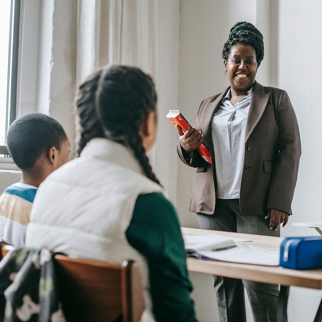 MS student teaching in classroom