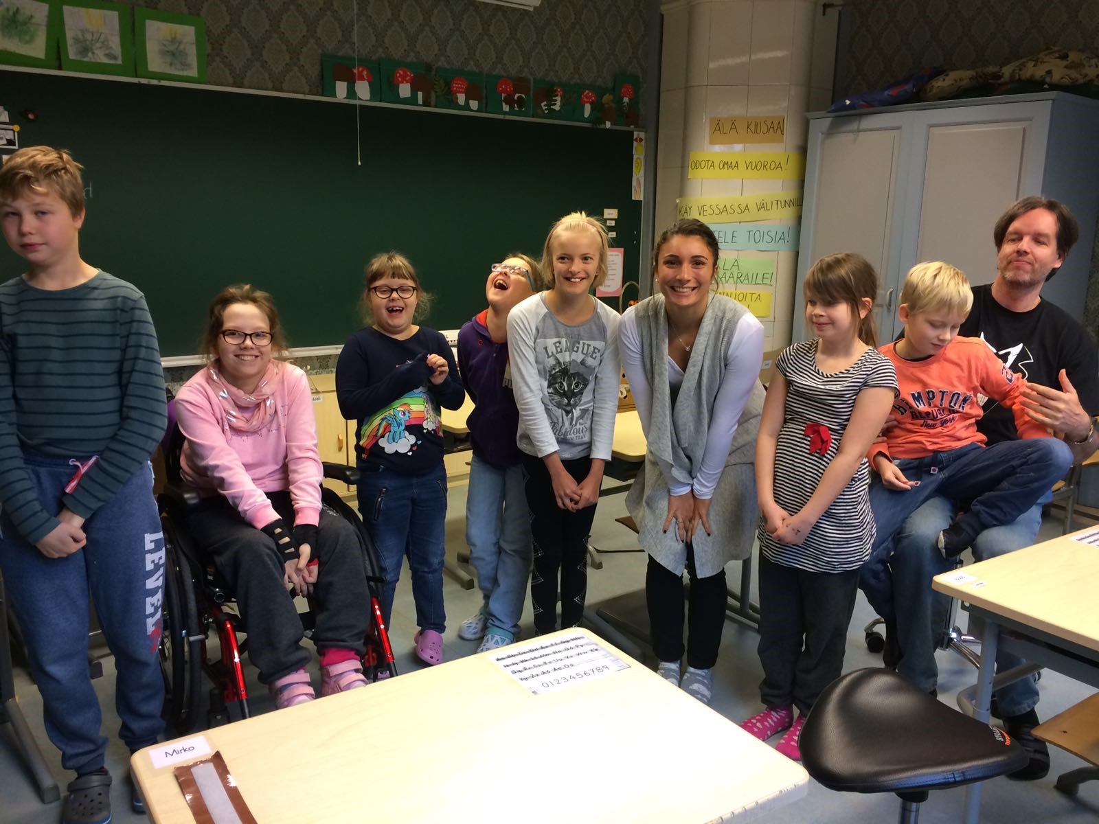 Jessica Volpe (pictured center) poses with her class in Finland.